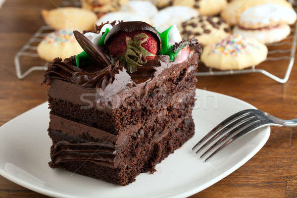 Csokoládés sütemény szelet sütik olasz jeges virágok Stock fotó © ArenaCreative