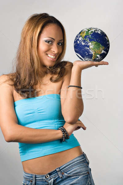 Világ kéz vonzó fiatal spanyol nő Stock fotó © ArenaCreative