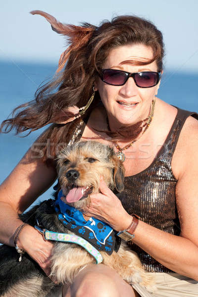 Woman Holding Her Pet Dog Stock photo © ArenaCreative