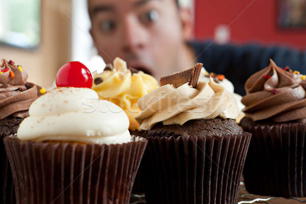 Man Wants to Eat Cupcakes Stock photo © ArenaCreative