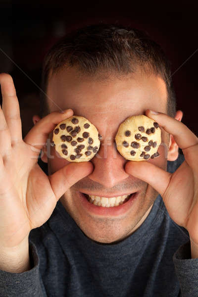 Férfi süti szemek őrült sütik étel Stock fotó © ArenaCreative