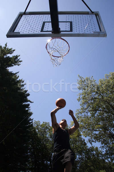 Kosárlabdázó fiatal vezetés szexi fitnessz ugrás Stock fotó © ArenaCreative