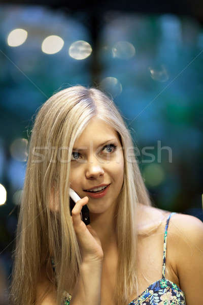 Szőke nő mobiltelefon mosolyog vonzó beszél meleg Stock fotó © arenacreative