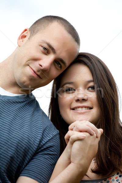Happy Interracial Married Couple Stock photo © ArenaCreative