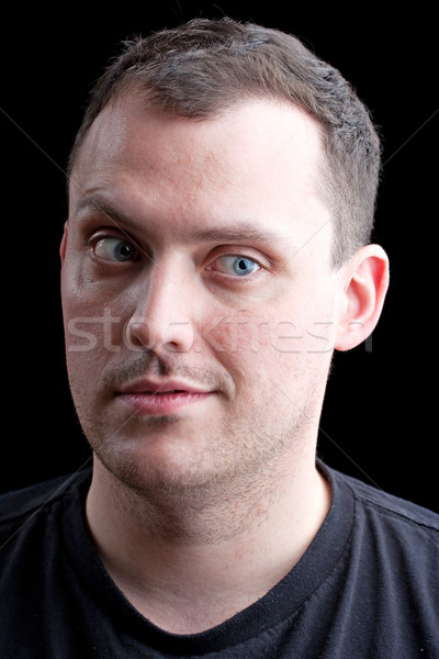 Szkeptikus férfi kétséges arc izolált fekete Stock fotó © ArenaCreative