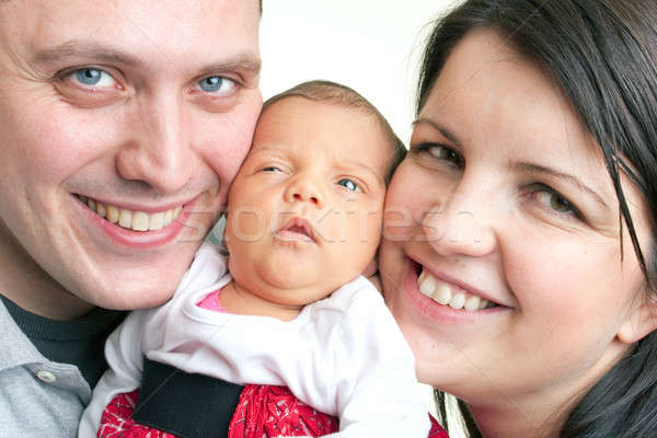 Excited Parents with a Newborn Baby Stock photo © ArenaCreative