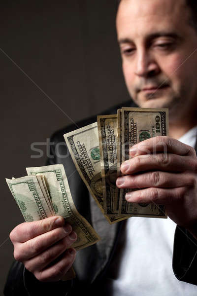 Man Counting Cash Stock photo © ArenaCreative