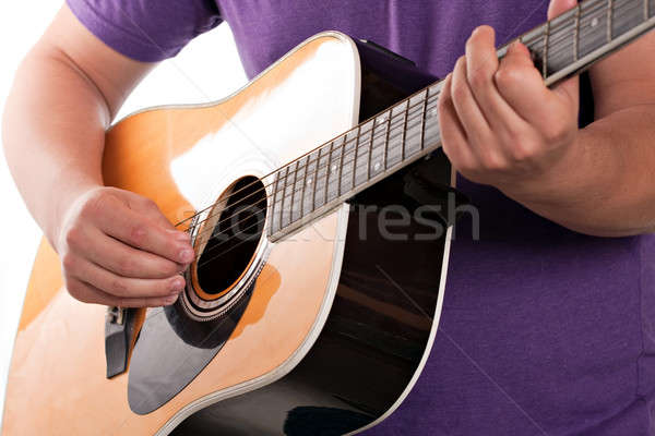 Elektrik akustik gitarist eller akustik gitar Stok fotoğraf © ArenaCreative
