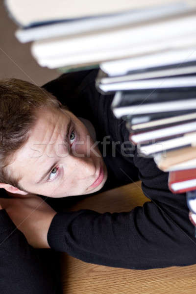 Student Looking at Homework Stock photo © ArenaCreative