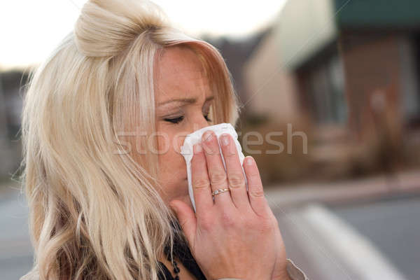 Blowing Her Nose Stock photo © ArenaCreative