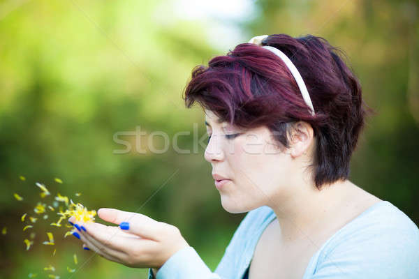 Woman Blowing Flower Petals Stock photo © arenacreative