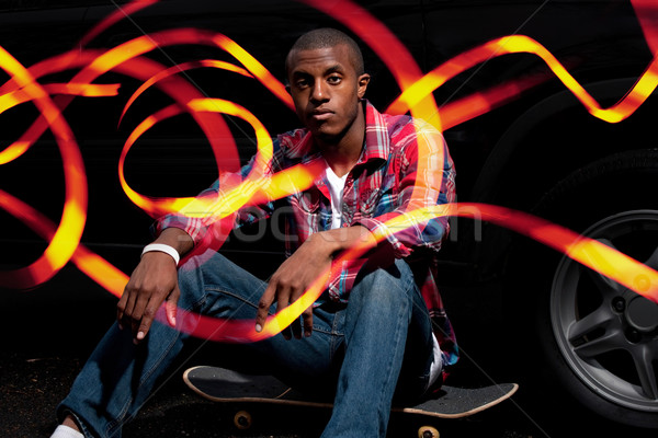 Cool Skateboarder Hanging Out with Light Trails Stock photo © ArenaCreative
