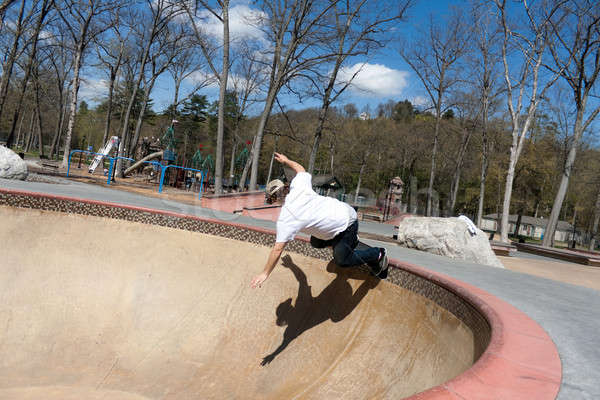 Skater Skating Around the Bowl Stock photo © ArenaCreative