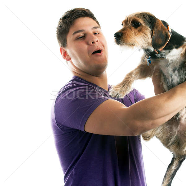 Stock photo: Man Holding His Pet Dog