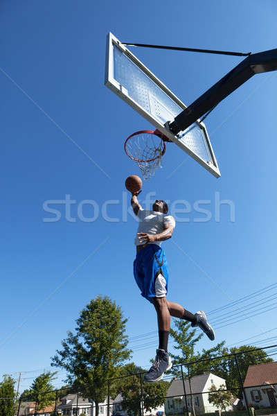 Basketball Player Dunking Stock photo © ArenaCreative