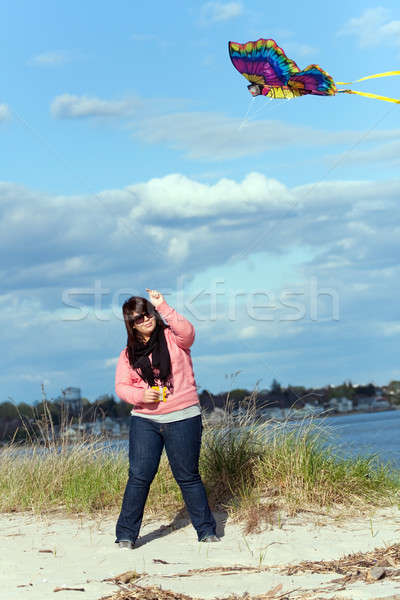 [[stock_photo]]: Fille · kite · mer · rive · jeune · femme · battant