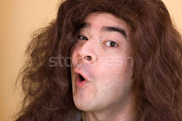 őrült rocker csávó modell hosszú haj vicces Stock fotó © ArenaCreative