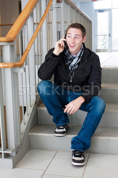 Cool Guy Talks on His Cell Phone Stock photo © ArenaCreative