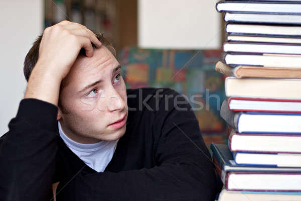 Stressed Student Looks At Books Stock photo © ArenaCreative