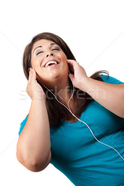 Stereo kulaklık çekici koyu esmer kadın dinleme Stok fotoğraf © ArenaCreative