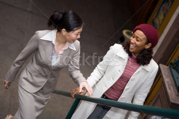 Negocios mujeres ciudad dos casual reunión Foto stock © ArenaCreative