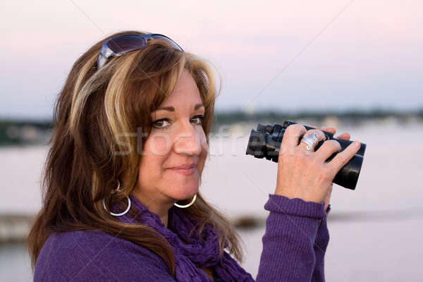 Woman with Binoculars Stock photo © ArenaCreative