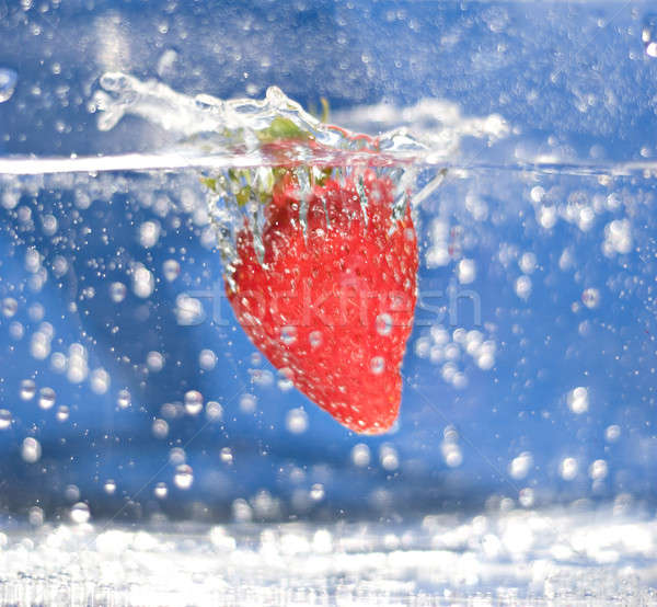 Strawberry In Water Stock photo © ArenaCreative