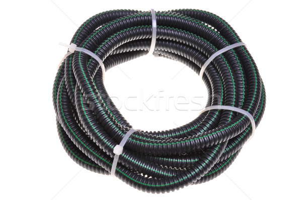 Corrugated pipe for electrical cables coiled in a circle Stock photo © Arezzoni