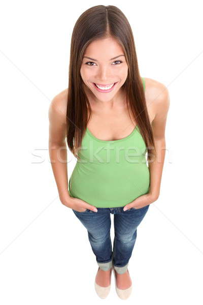 Stock photo: Isolated casual young woman smiling