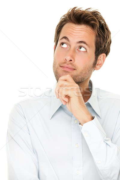 Gondolkodik fiatalember férfi izolált fehér közelkép Stock fotó © Ariwasabi