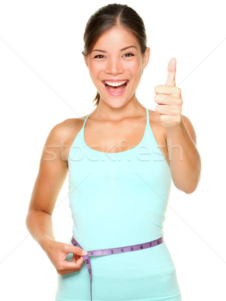 Vrouw glimlachen gelukkig opgewonden permanente meetlint Stockfoto © Ariwasabi
