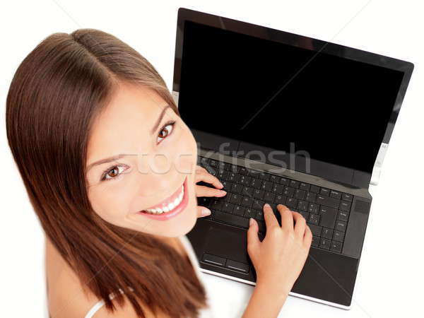 Portable femme utilisant un ordinateur portable ordinateur pc espace de copie Photo stock © Ariwasabi