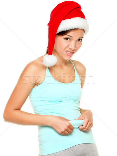 Christmas fitness woman - funny weight loss concept Stock photo © Ariwasabi