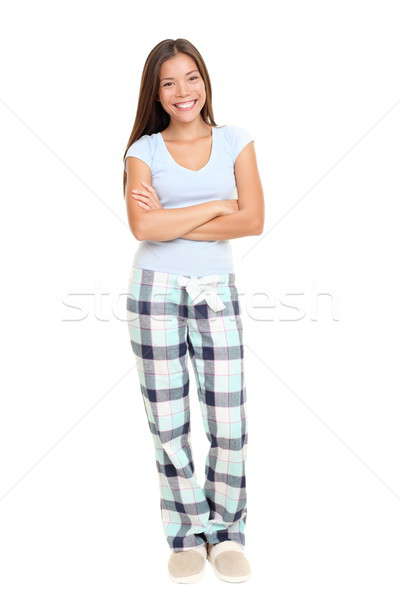 Сток-фото: женщину · Постоянный · пижама · улыбаясь · изолированный · белый