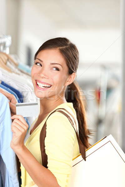 Shopping woman showing credit card Stock photo © Ariwasabi