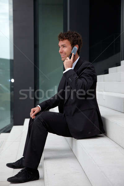 Iş adamı merdiven telefon ev telefon işadamı Stok fotoğraf © armstark