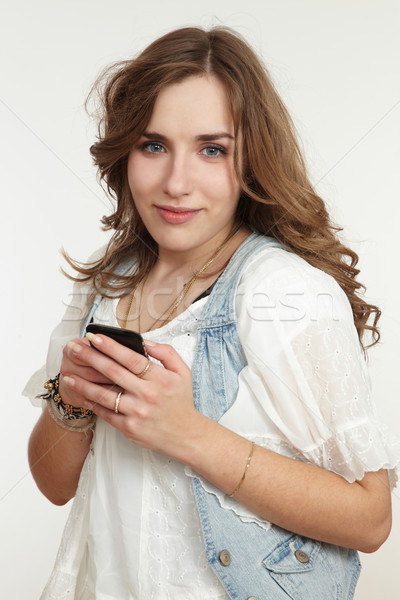 Menina telefone móvel negócio mulher tecnologia notícia Foto stock © armstark