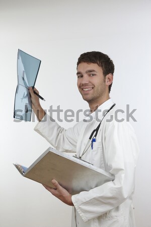 Jovem médico estetoscópio laboratório branco escrever Foto stock © armstark