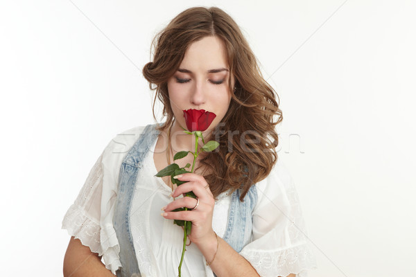girl smelling a rose Stock photo © armstark