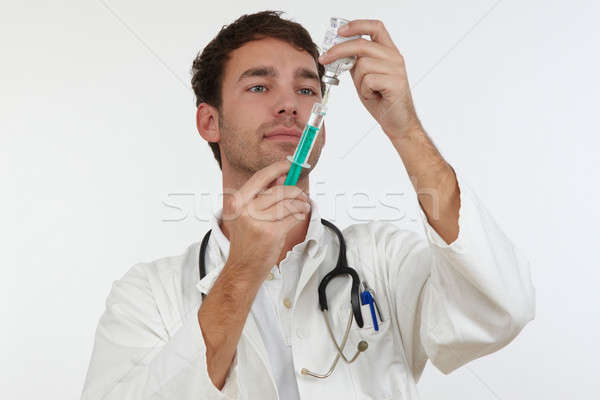 Lekarza wstrzykiwań medycznych pracy biały chorych Zdjęcia stock © armstark