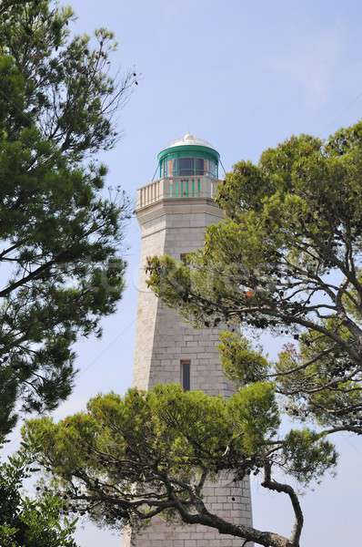 Farol mediterrânico costa barco navio ajudar Foto stock © arocas