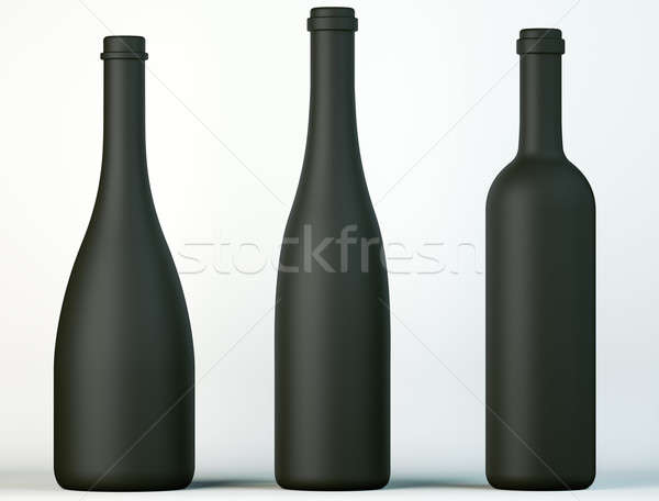 Three uncorked black bottles for wine or beverages  Stock photo © Arsgera