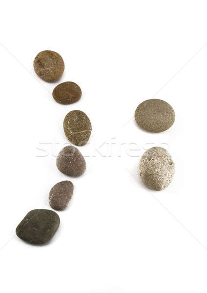 Negative sad emoticon assembled of pebble Stock photo © Arsgera