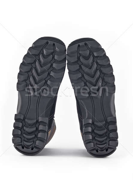 Rubber sole of boots over white Stock photo © Arsgera