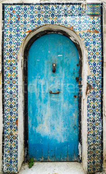 Blue aged door with ornament and tiles from Sidi Bou Said in Tun Stock photo © Arsgera