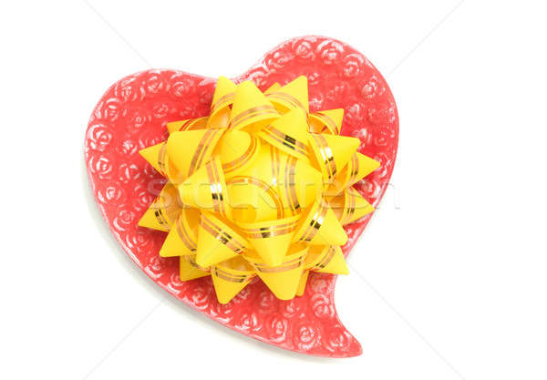 Love - yellow bow on red heart Stock photo © Arsgera