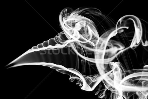 Abstraction: white smoke pattern and curves on black Stock photo © Arsgera