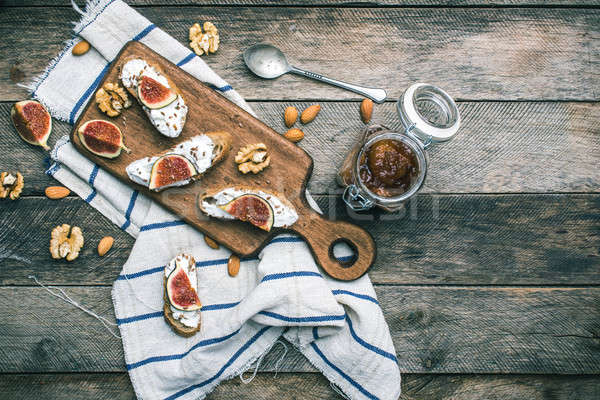 snacks with cheese jam and figs on wood Stock photo © Arsgera