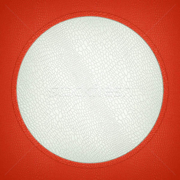 Red and white stitched circle shape on mock croc Stock photo © Arsgera