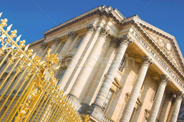 Palace facade and golden gate in Versailles Stock photo © Arsgera